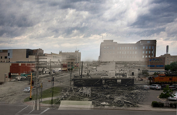 Fargo after fire, 1893, looking up Broadway from near Main Avenue.Elevated view looking north up Broadway showing ruins after fire of June 7, 1893. Visible in the image is the Northern Pacific railroa