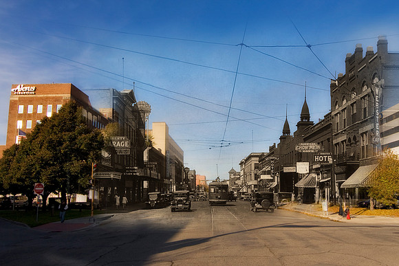 N.P. Ave. looking west, 1929  500 block of N.P. Avenue, with numerous automobiles and a street railroad car visible. Some business signs visible are Webster Hotel, Webster Cafe, American Chow Mein Caf